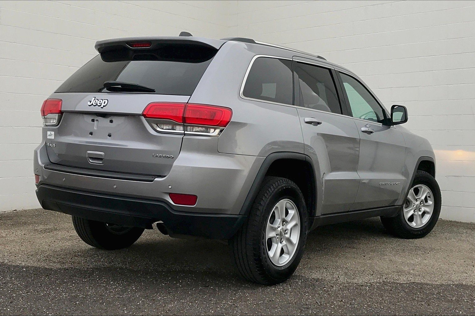 PreOwned 2016 Jeep Grand Cherokee 4WD 4dr Laredo 4D Sport Utility in